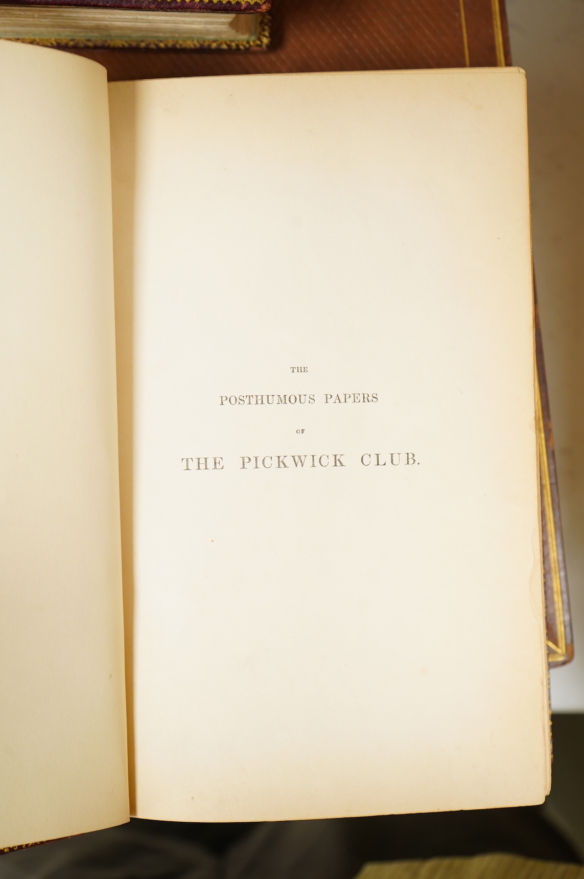 Dickens, Charles - The Posthumous Papers of the Pickwick Club. First Edition. Extra - Illustrated copy (bound as 2 vols.). pictorial engraved title, frontis. and 41 plates (by H.K. Browne, Seymour & Buss), half title; re